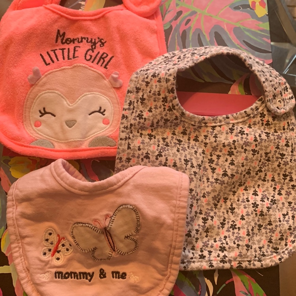 3 pack of baby girl one sizes by Carter’s bibs